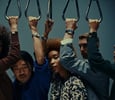 Chrono24 Time Is Our Thing promo image — five people holding train handles, watches on wrists