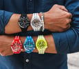 full lineup of Swatch ScubAqua models on wrists