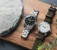 Hamilton Khaki Field Mechanical Power Reserve models side by side, flat-lay