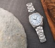 RZE Resolute 36 Halcyon flat-lay between a stone and wood