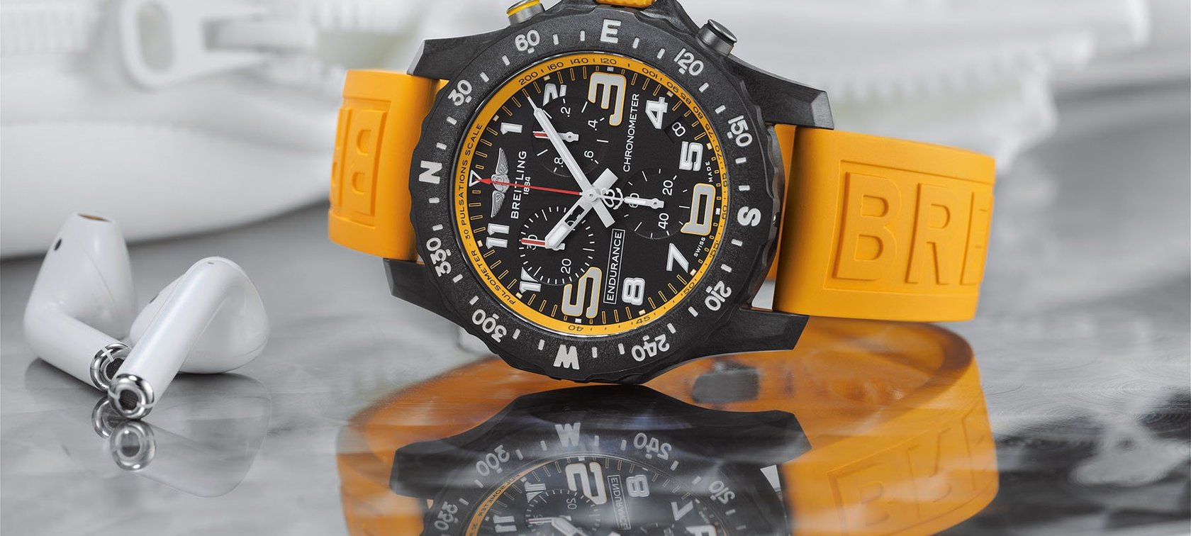 Endurance Pro with a yellow inner bezel and rubber strap