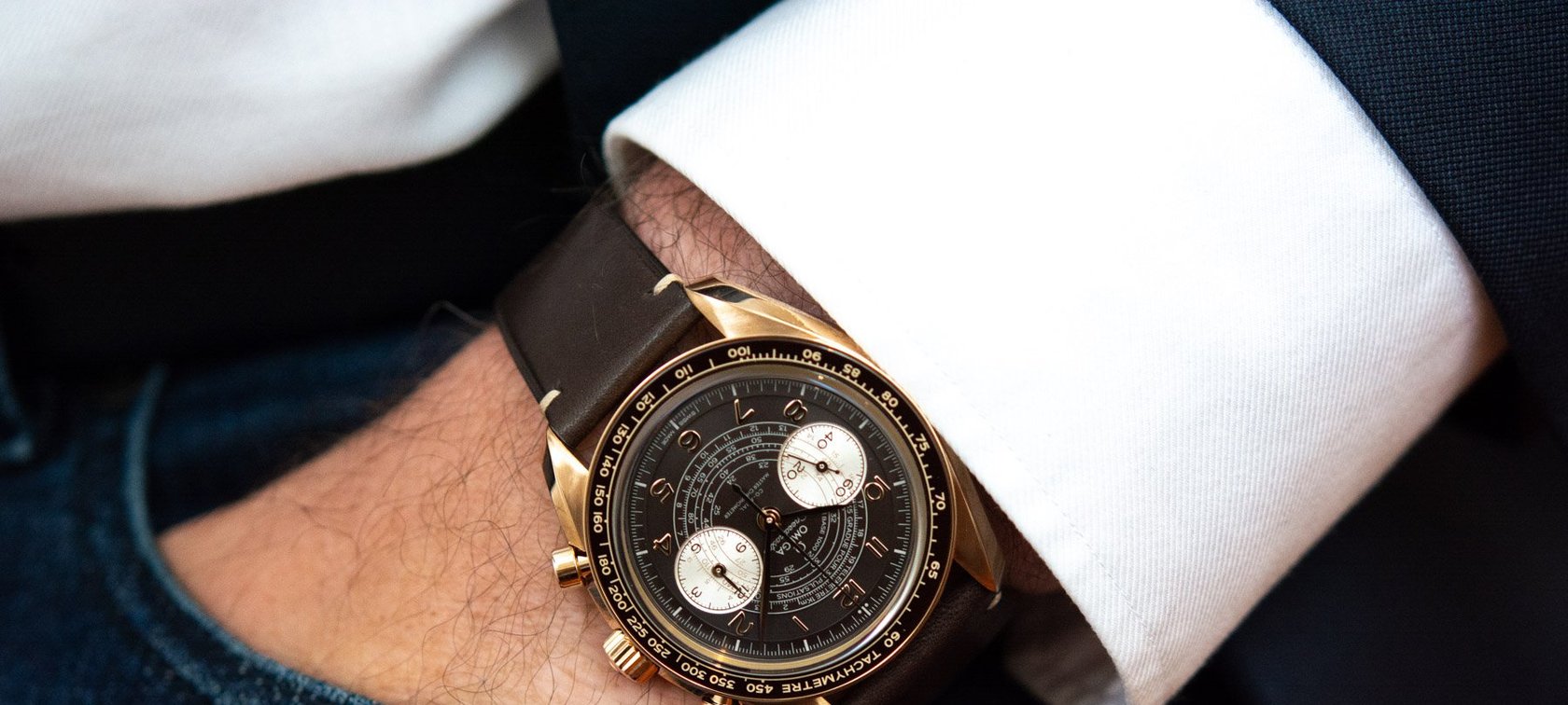 wristshot Omega Speedmaster Chronoscope bronze gold