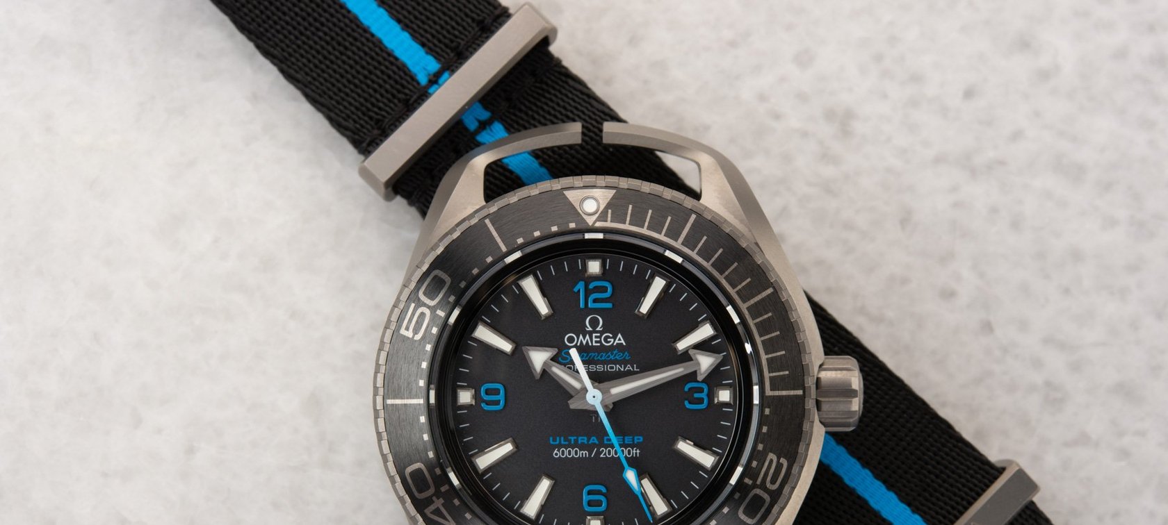 The Best Titanium Dive Watches Currently Available — Top 10 From Rolex, Omega, Grand Seiko, And More