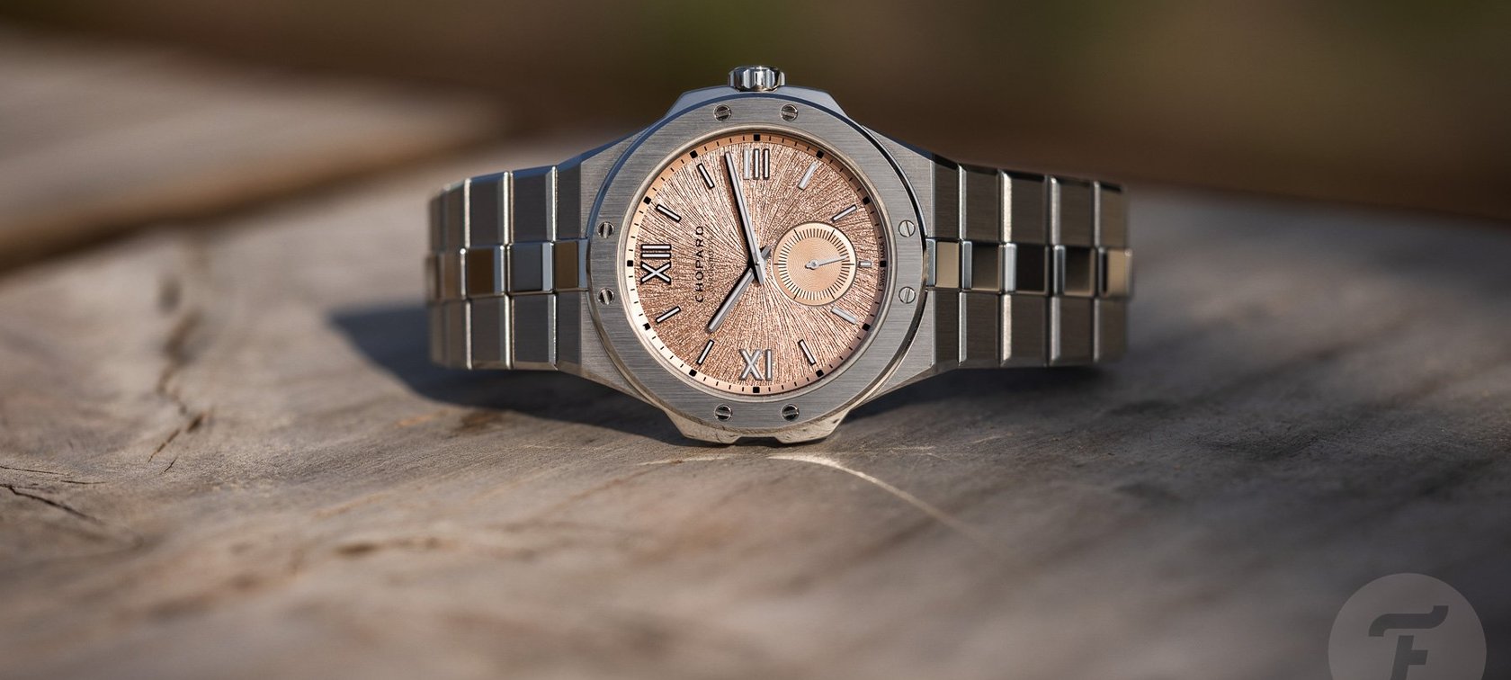 Chopard Alpine Eagle 41 XPS on wooden table, crown up