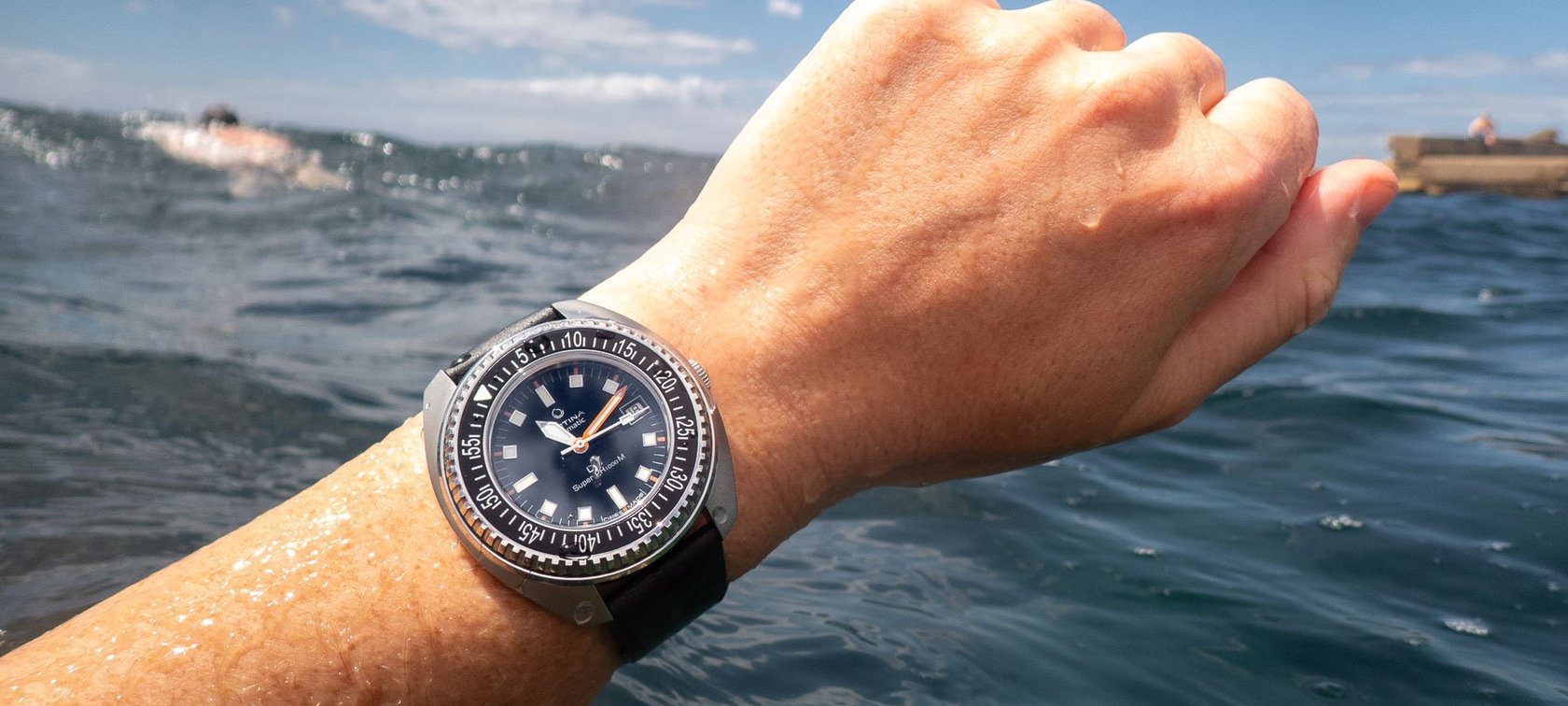 dive watches with heritage — Certina DS Super PH1000M on wrist in water