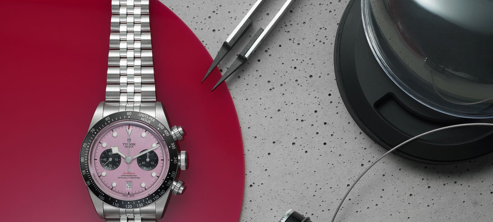 watches with colorful dials — Tudor Black Bay Chrono pink dial flat-lay header image