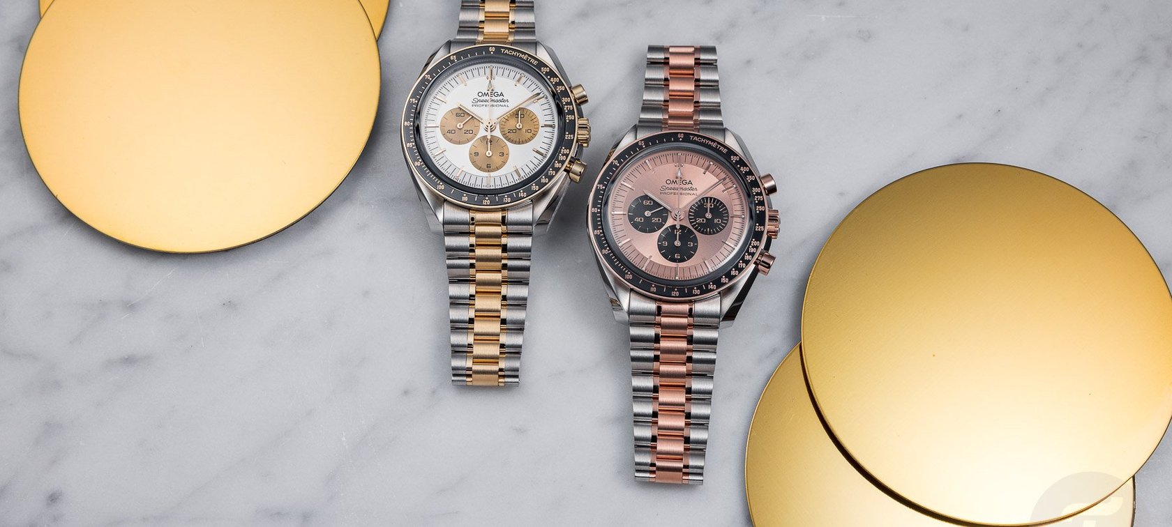 steel-and-gold Omega Speedmaster Professional models side by side