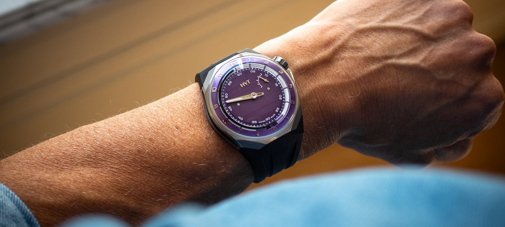 HYT T1 Millésime purple on wrist