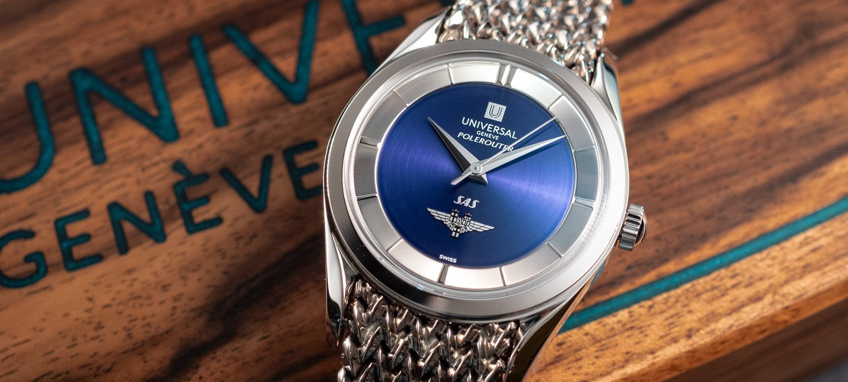 white gold Universal Genève SAS Polerouter on wooden box