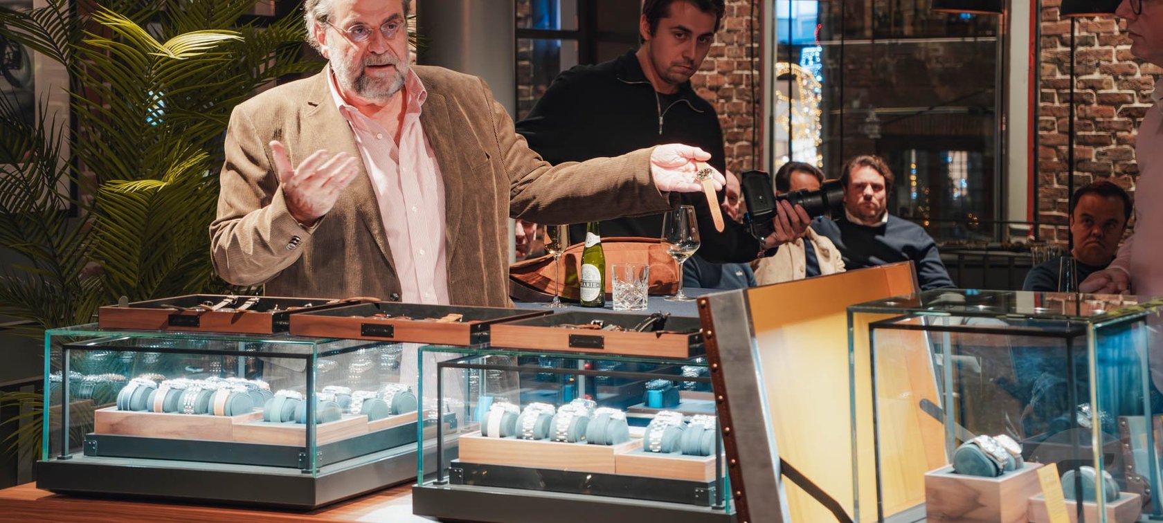 Fred Mandelbaum giving a talk at the Breitling boutique in The Hague