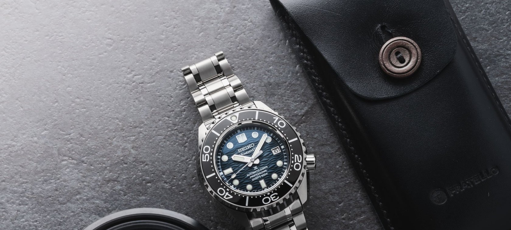 Seiko Prospex Marinemaster SLA081 flat-lay header image