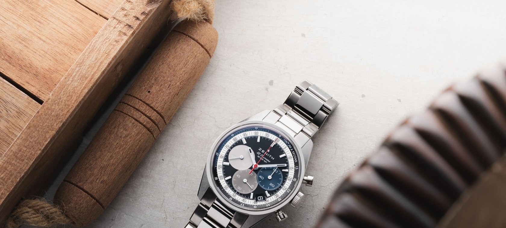 black-dial Zenith Chronomaster Original flat-lay