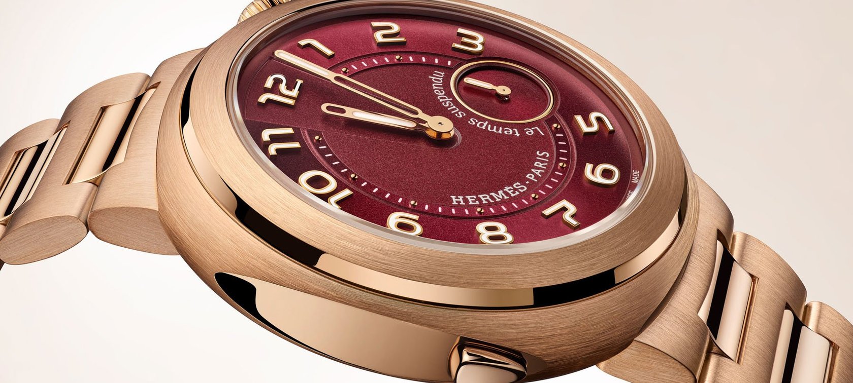 rose gold and burgundy Hermès Cut Le Temps Suspendu profile view