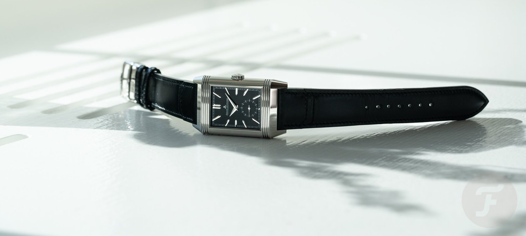 Jaeger-LeCoultre Reverso Tribute Duoface Small Seconds ref. Q398847J with black dial, crown up