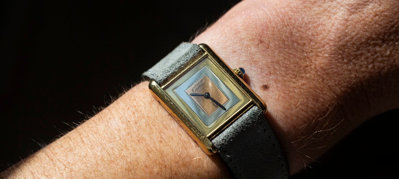Must De Cartier Tank on wrist