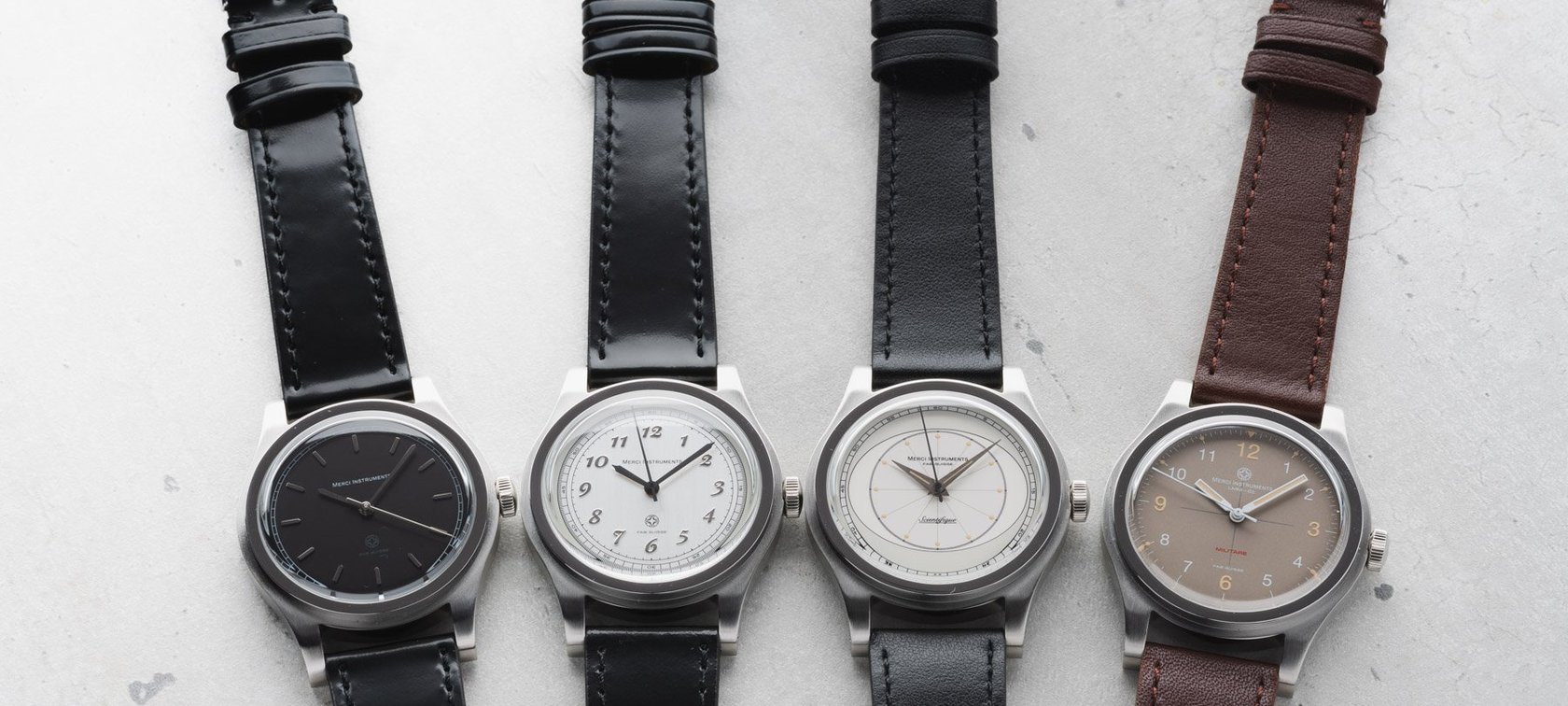 Merci Instruments LMM-01 Dress, Numerals, Scientifique, and Militare side by side