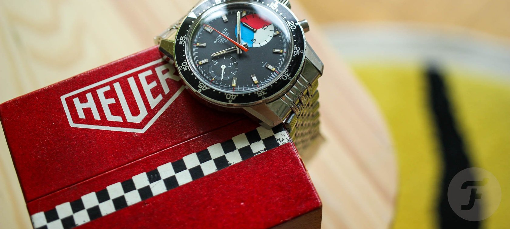 Heuer Skipper Ref. 7764 hanging off edge of Heuer box