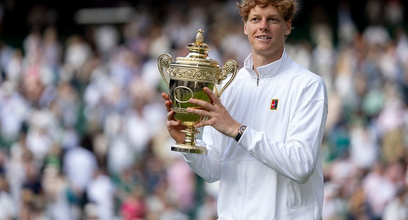 Jannik Sinner holding Wimbledon 2025 trophy and wearing Rolex Daytona