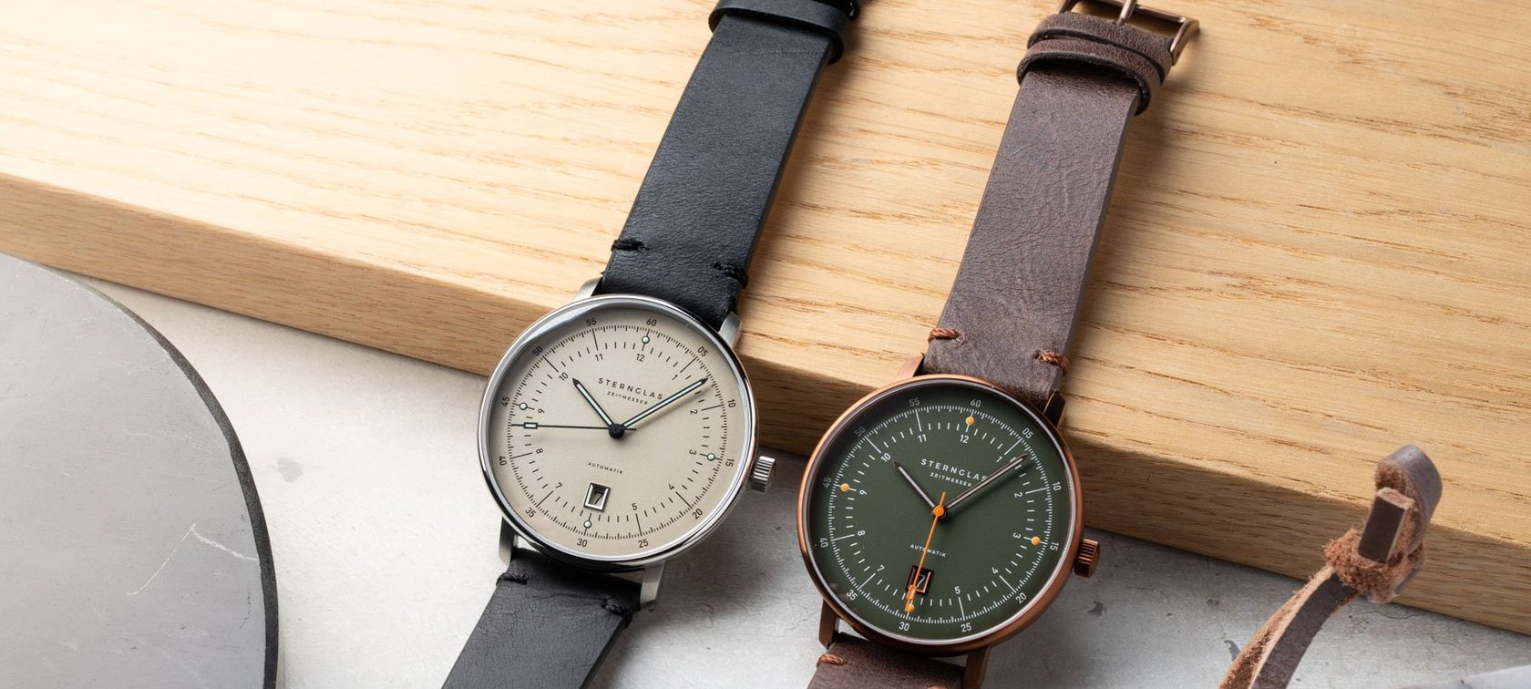 Sternglas Hamburg Pro Automatik Alabaster and Dark Green side by side