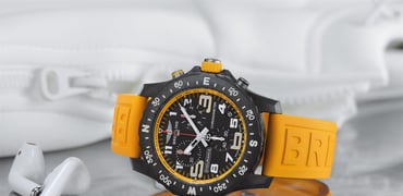Endurance Pro with a yellow inner bezel and rubber strap