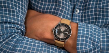 38mm Blancpain Bathyscaphe on wrist, arms crossed