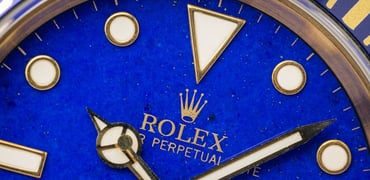 top 5 Rolex sports watches with stone dials — Rolex Submariner 16618 with lapis lazuli