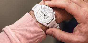 Omega × Swatch MoonSwatch Snoopy Mission To The Moonphase on wrist