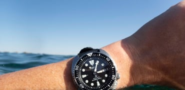 Seiko Turtle SRPE93 on wrist in water