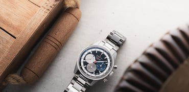 black-dial Zenith Chronomaster Original flat-lay