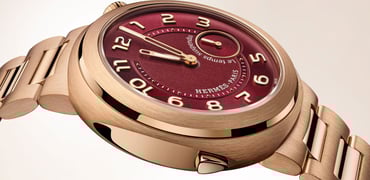 rose gold and burgundy Hermès Cut Le Temps Suspendu profile view