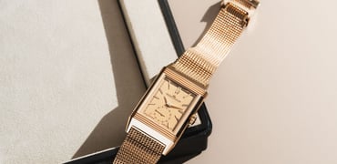 Watches and Wonders 2025 — pink gold Jaeger-LeCoultre Reverso Tribute Monoface Small Seconds with Milanese bracelet on edge of tray