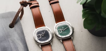 blue- and green-dial Yema Granvelle CMM.20 side by side, flat-lay header