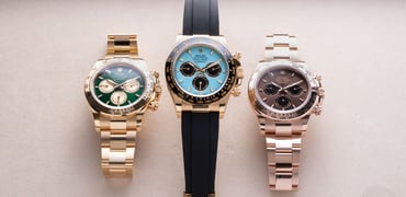 three 2025 Rolex Daytona models on tray