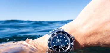 Rolex Sea-Dweller 16600 wrist shot on surface of water