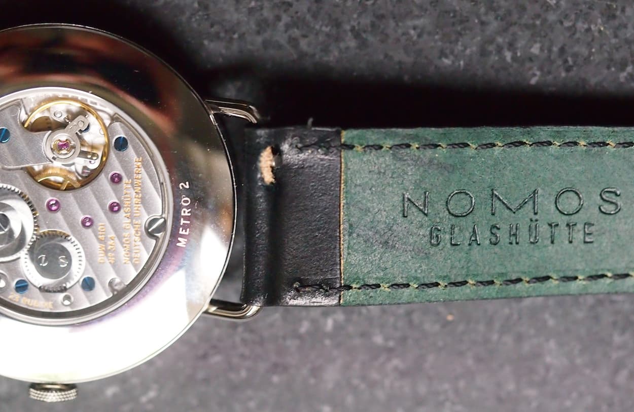 Nomos Metro 38 strap levers