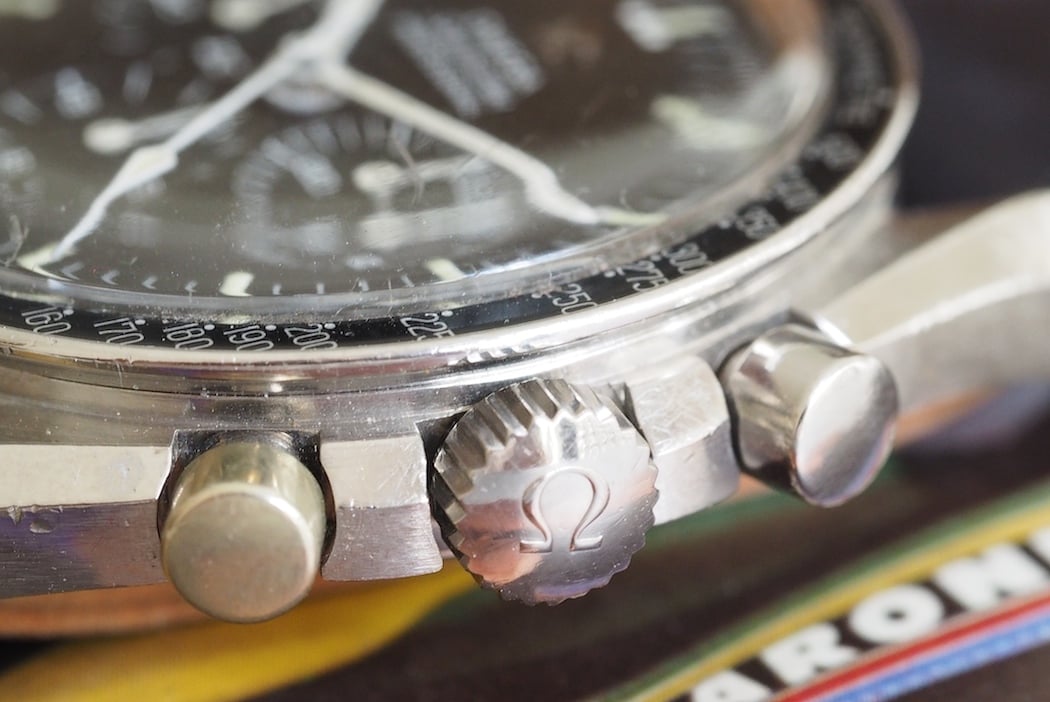 An original crown on an Omega Speedmaster 145.012
