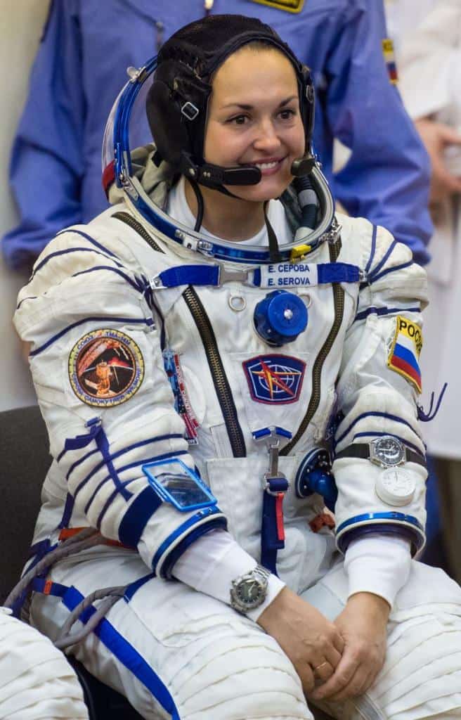 Elena Serova, wearing two Speedmaster watches