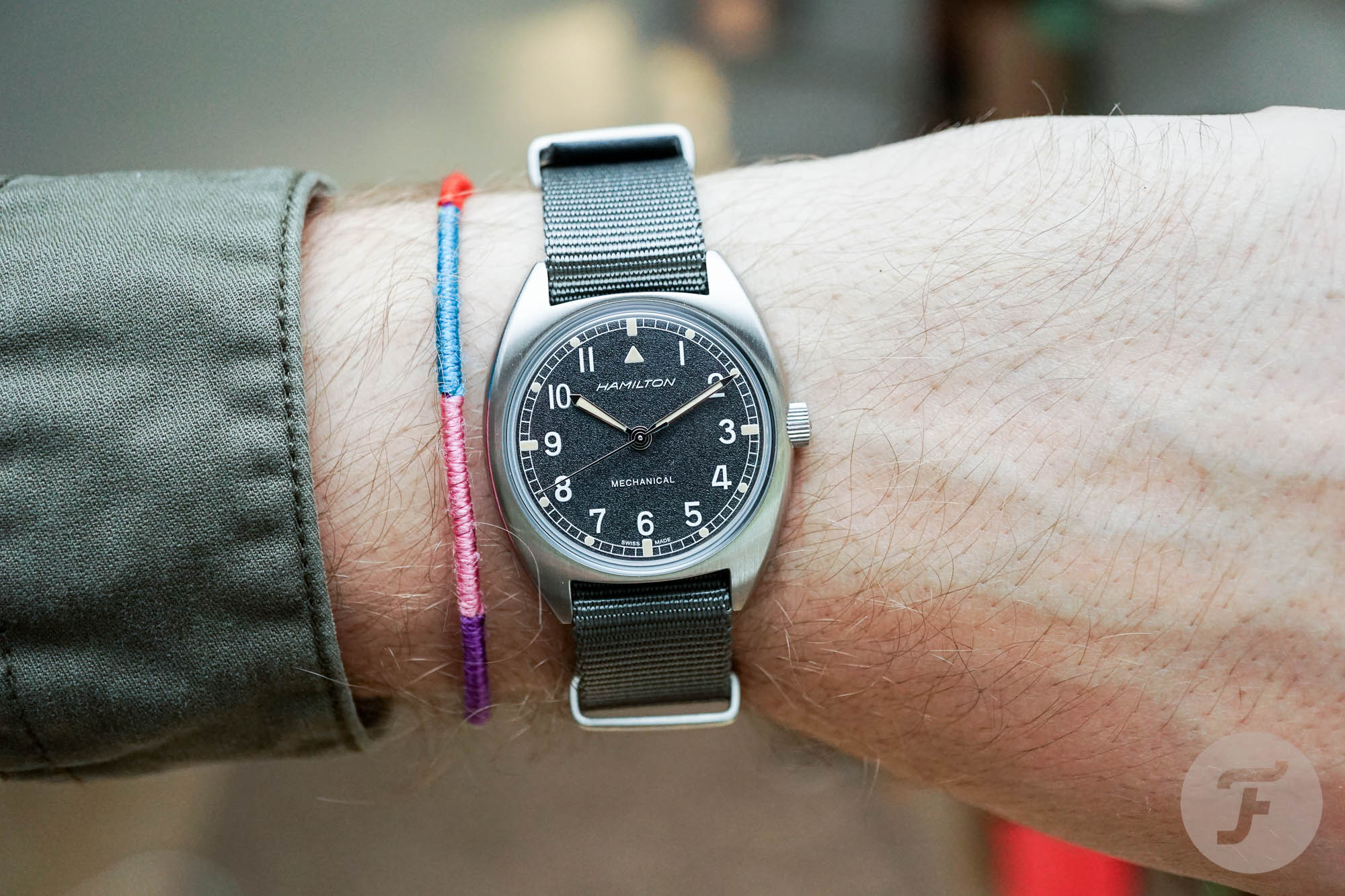Hamilton Khaki Aviation Pilot Pioneer Mechanical with gray NATO strap, wrist shot
