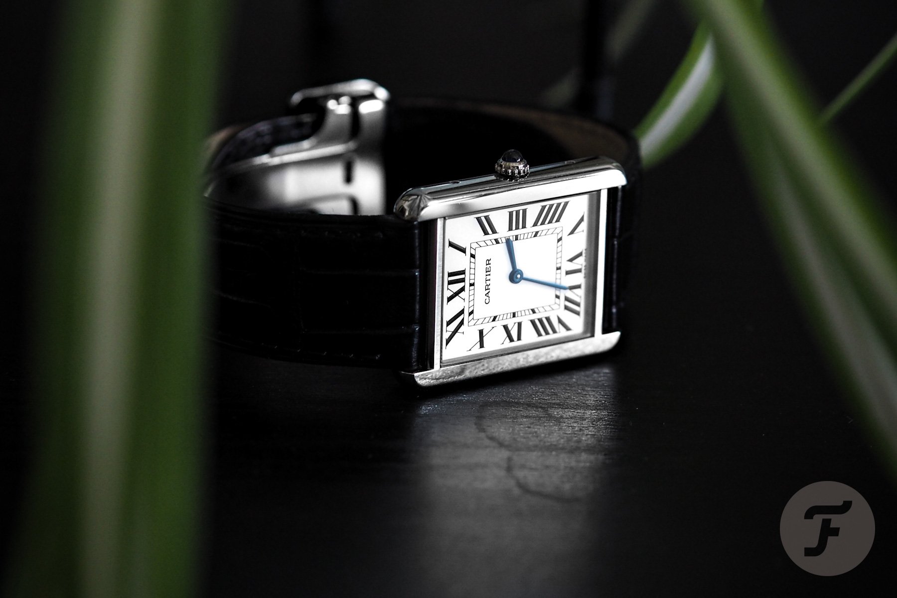 The Black Dial, Yellow Gold Cartier Tank Is A Must See