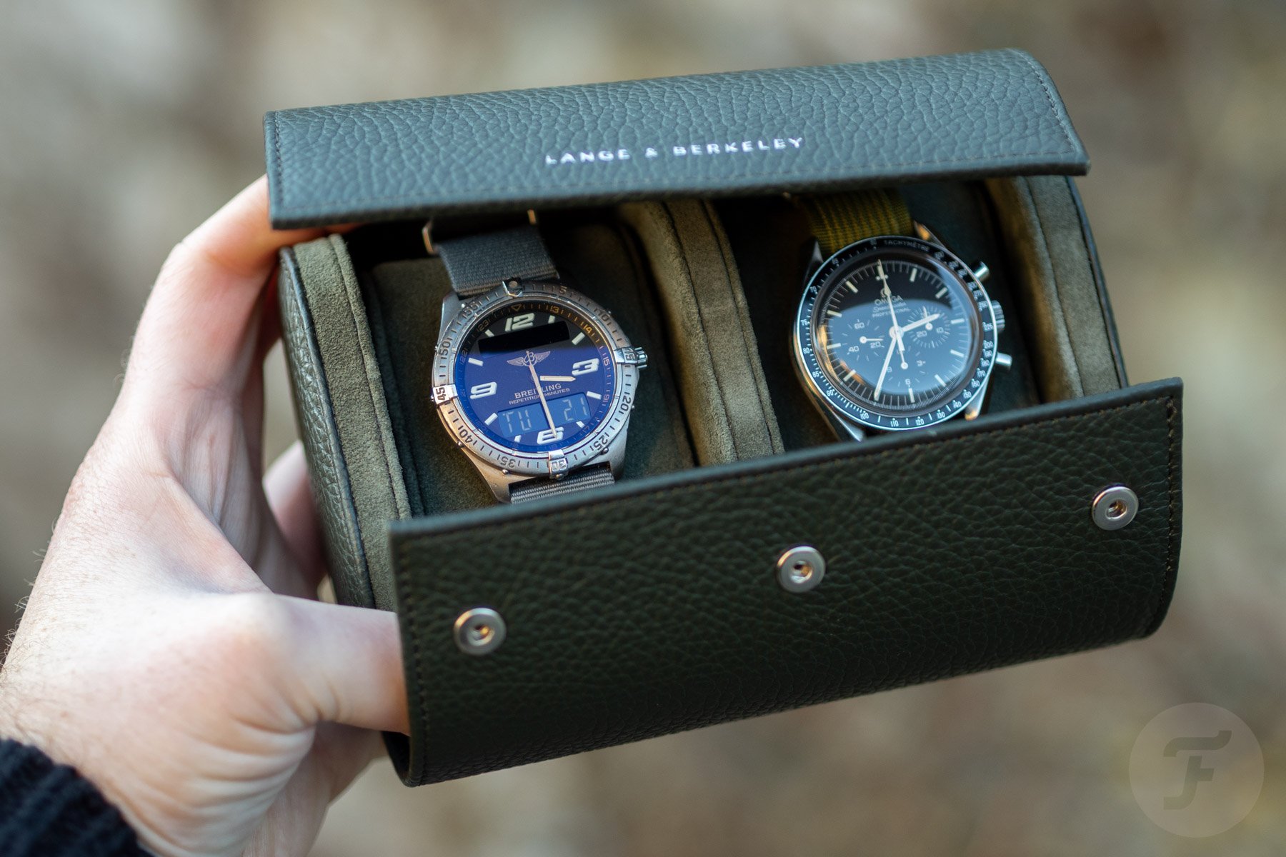 Breitling Aerospace and Omega Speedmaster Professional in Lange & Berkeley watch roll