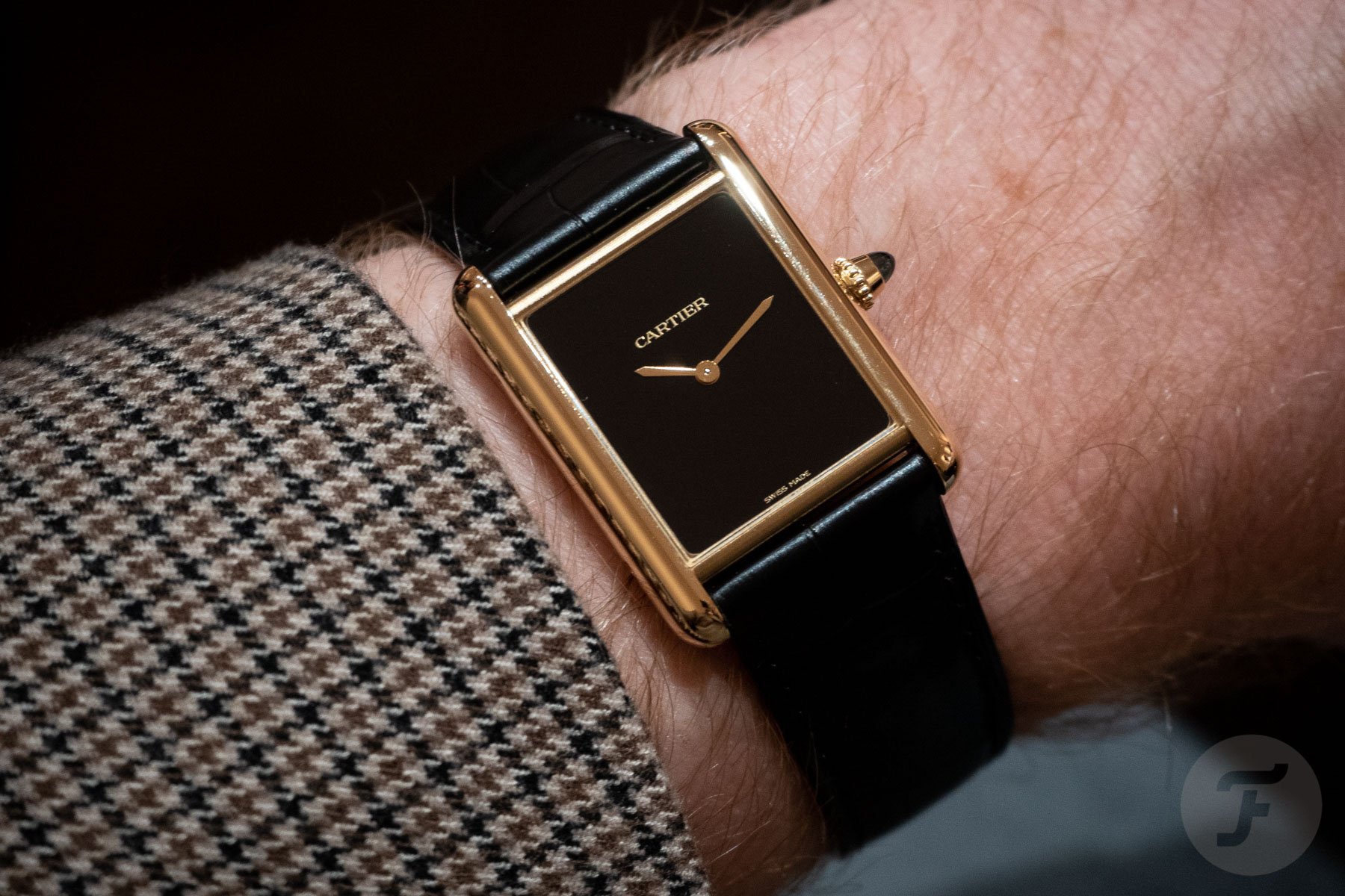 The Black Dial, Yellow Gold Cartier Tank Is A Must See