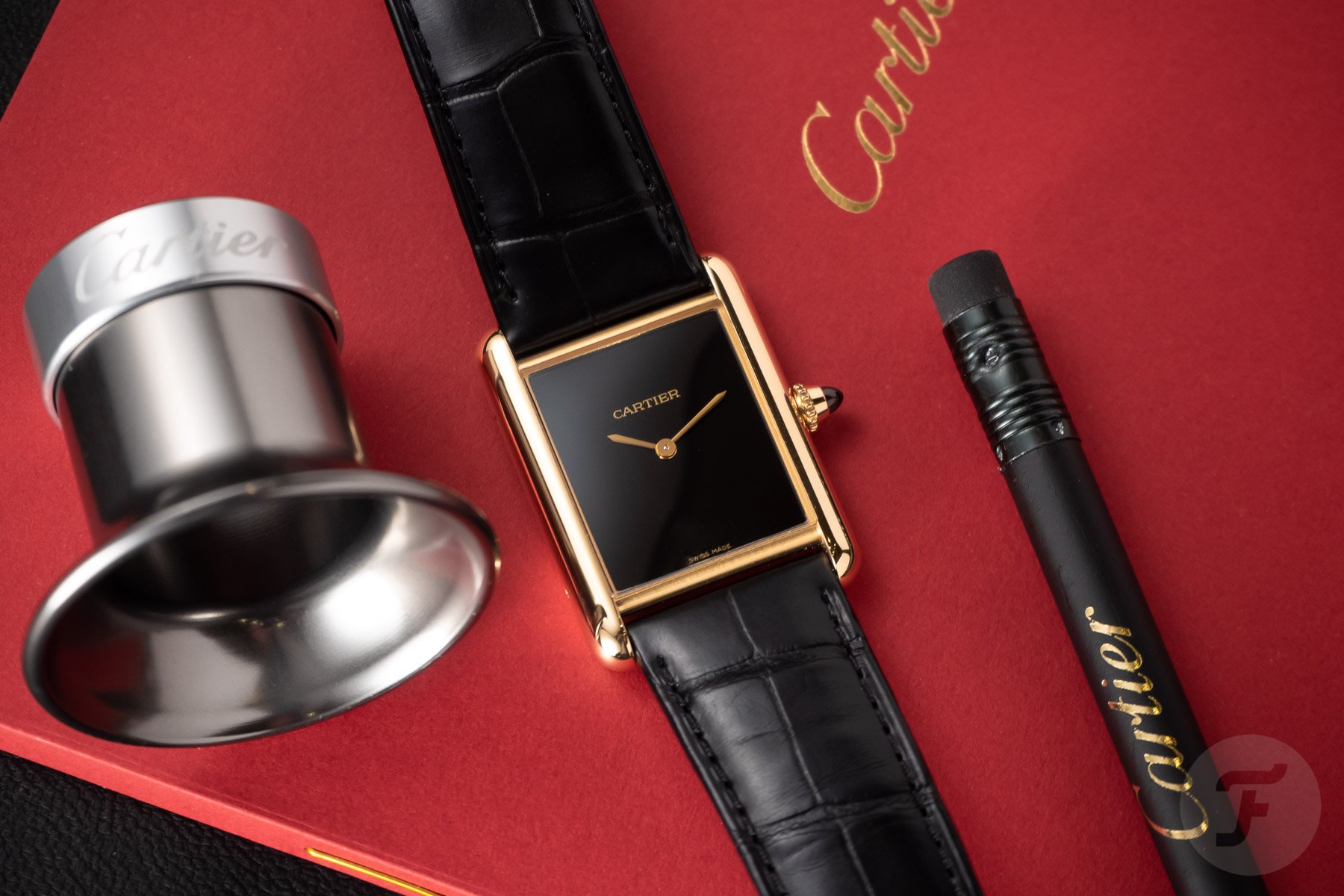 The Black Dial, Yellow Gold Cartier Tank Is A Must See