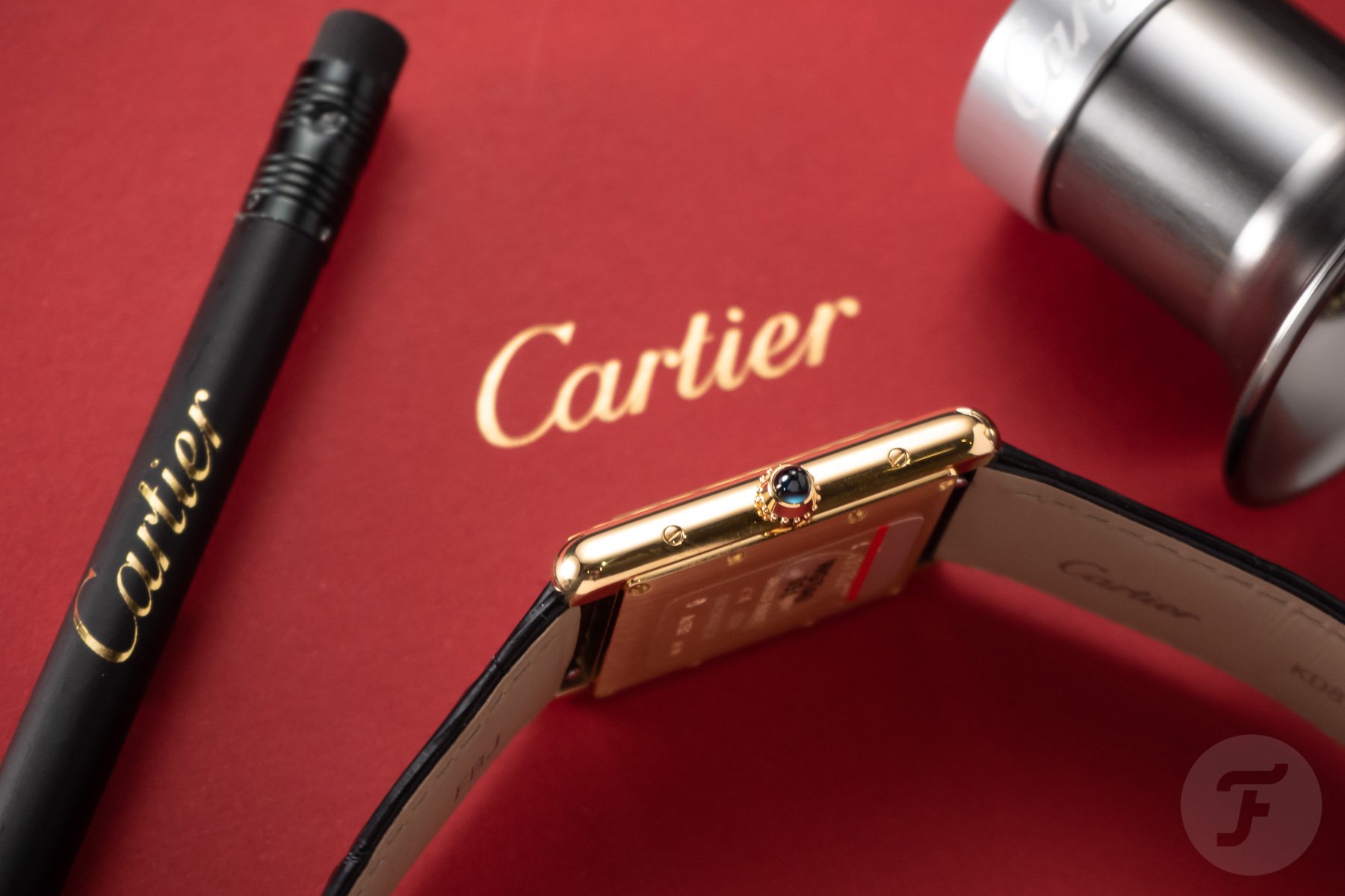 The Black Dial, Yellow Gold Cartier Tank Is A Must See