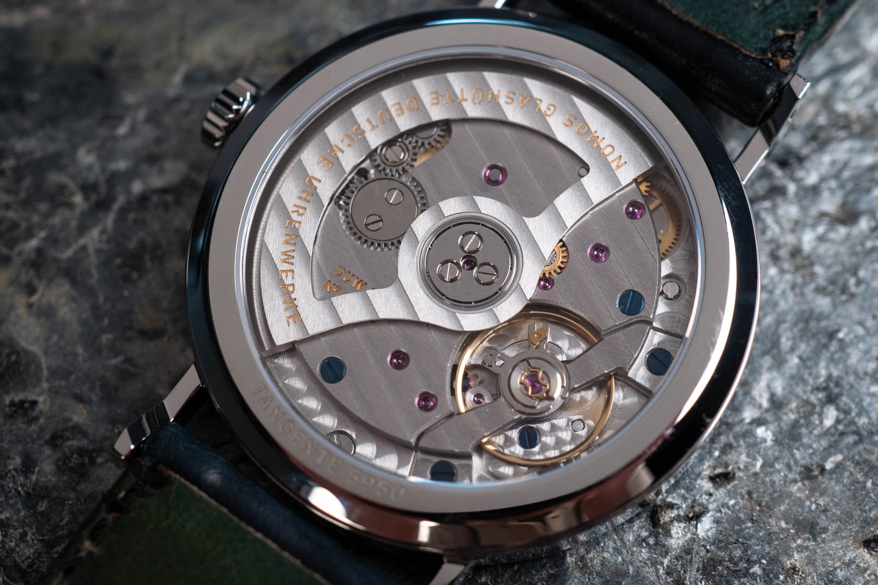 blue-dial Nomos Tangente Neomatik 39 case back and movement