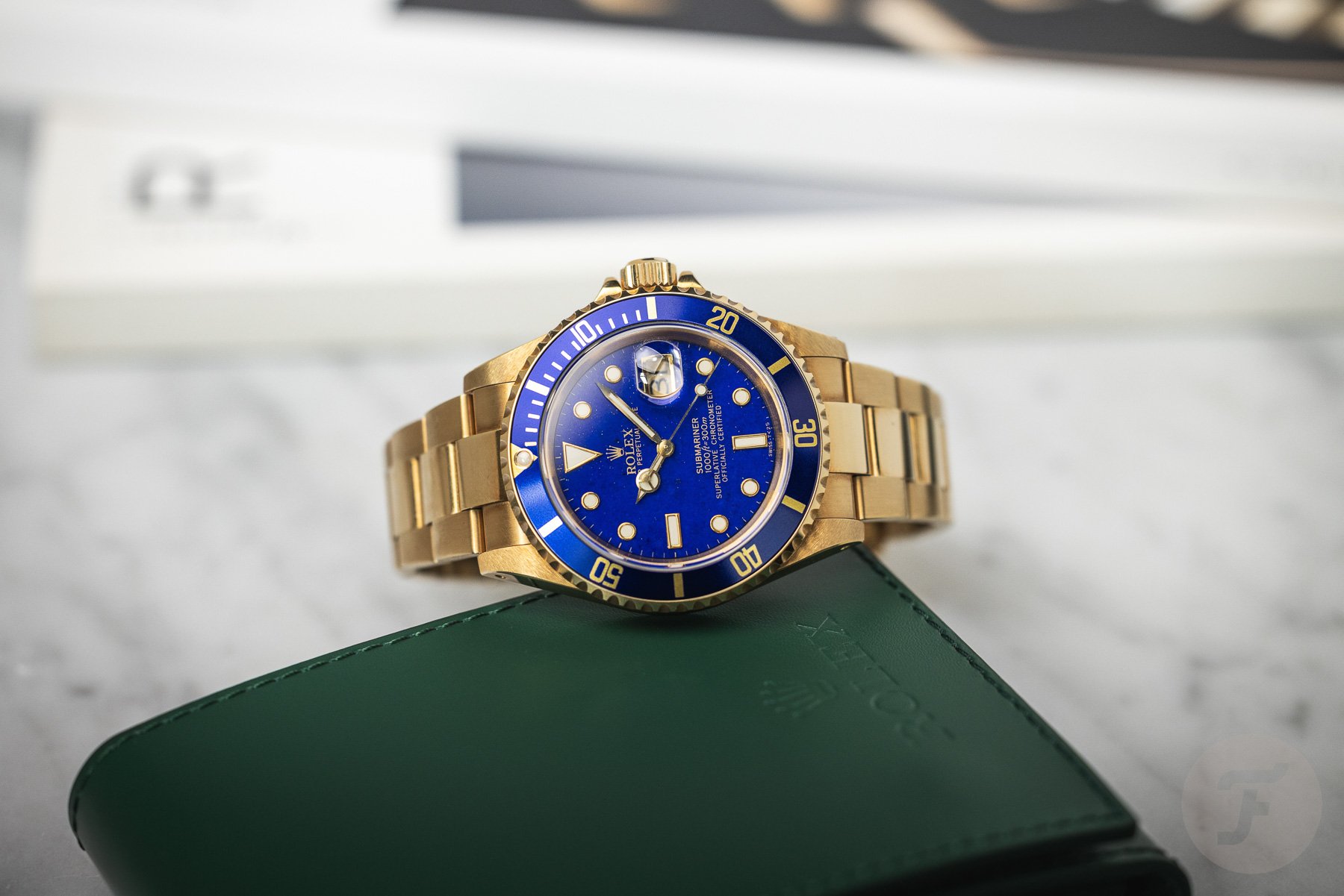 Rolex Submariner 16618 Lapis Lazuli pre-owned full-gold