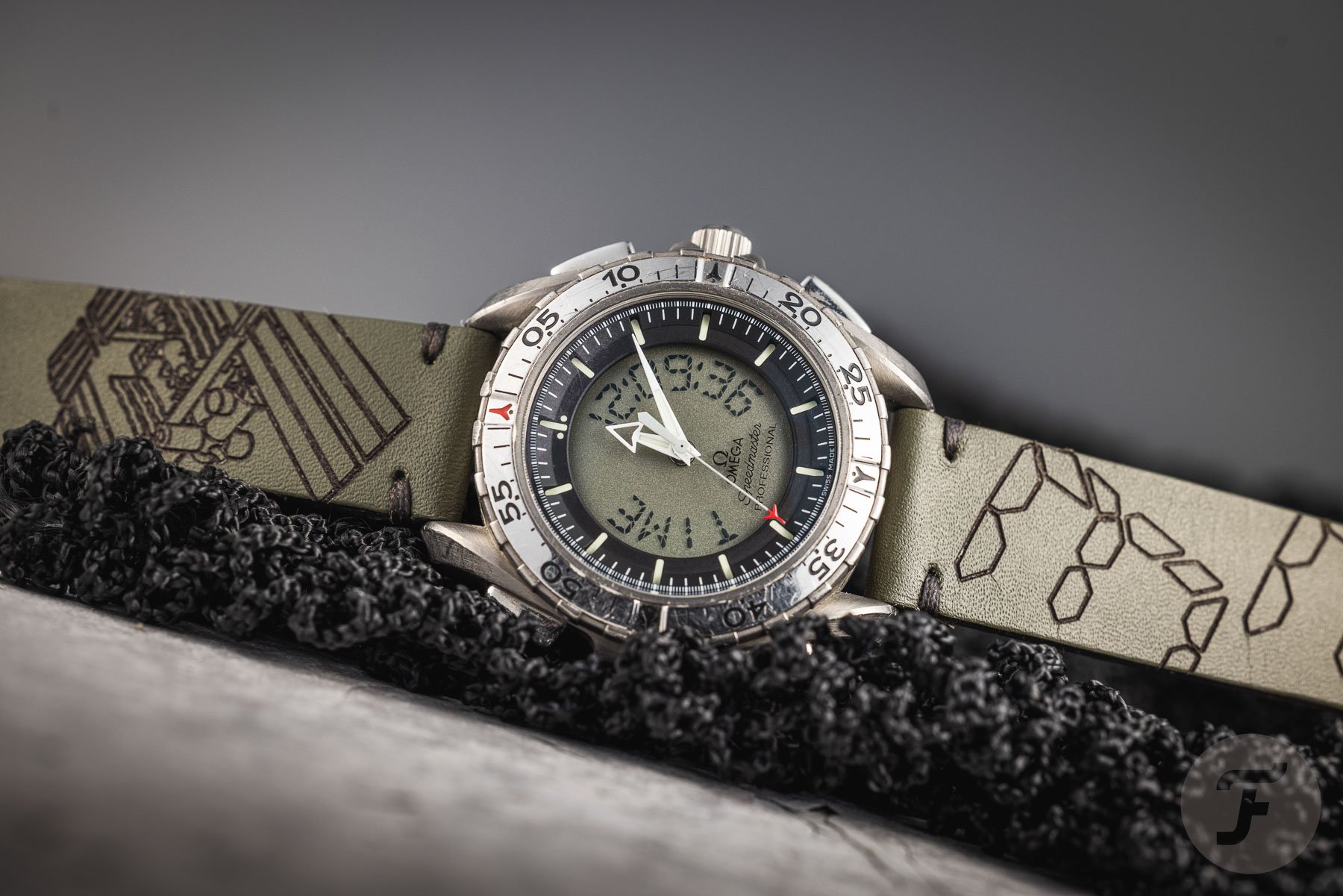 1990s Omega Speedmaster Professional X-33 ref. 3990.50 on its side, crown up
