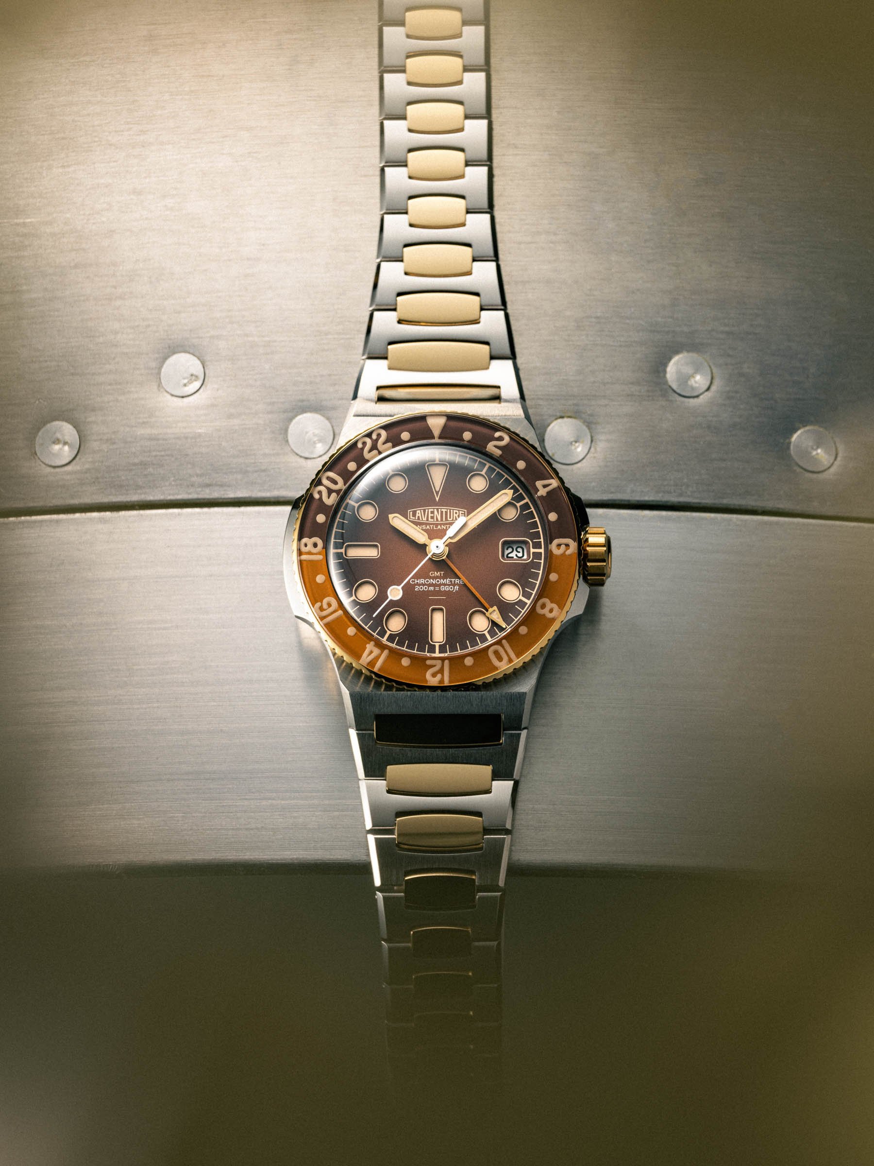 two-tone Laventure Transatlantique II GMT flat-lay