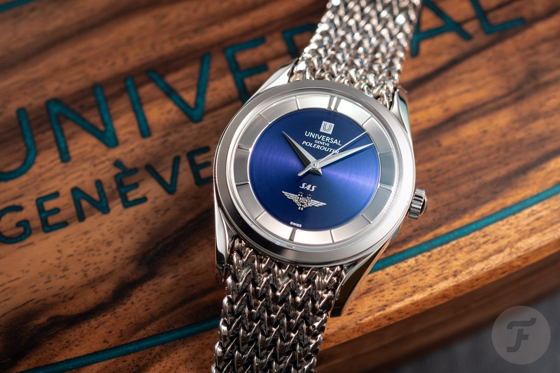 white gold Universal Genève SAS Polerouter on wooden box
