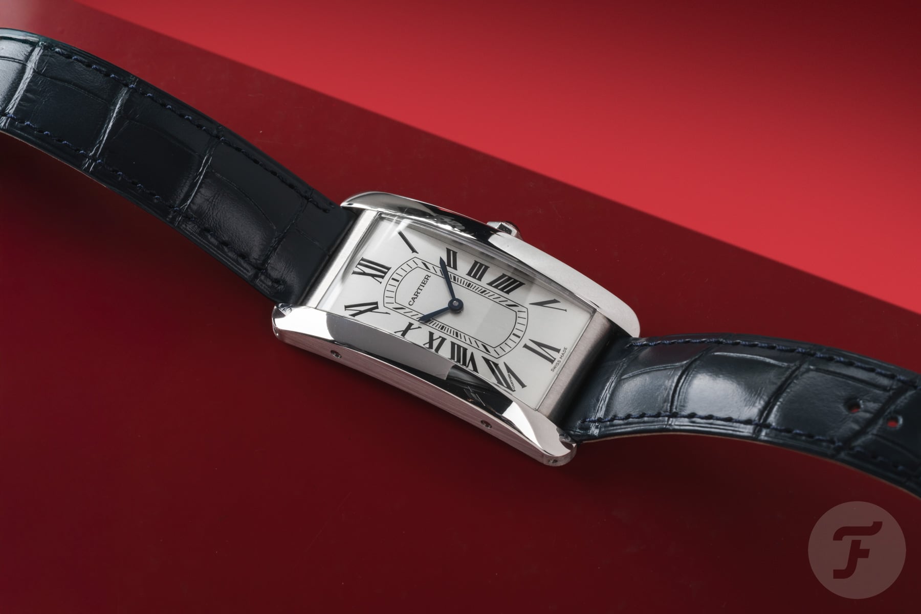 Cartier Tank Américain flat-lay