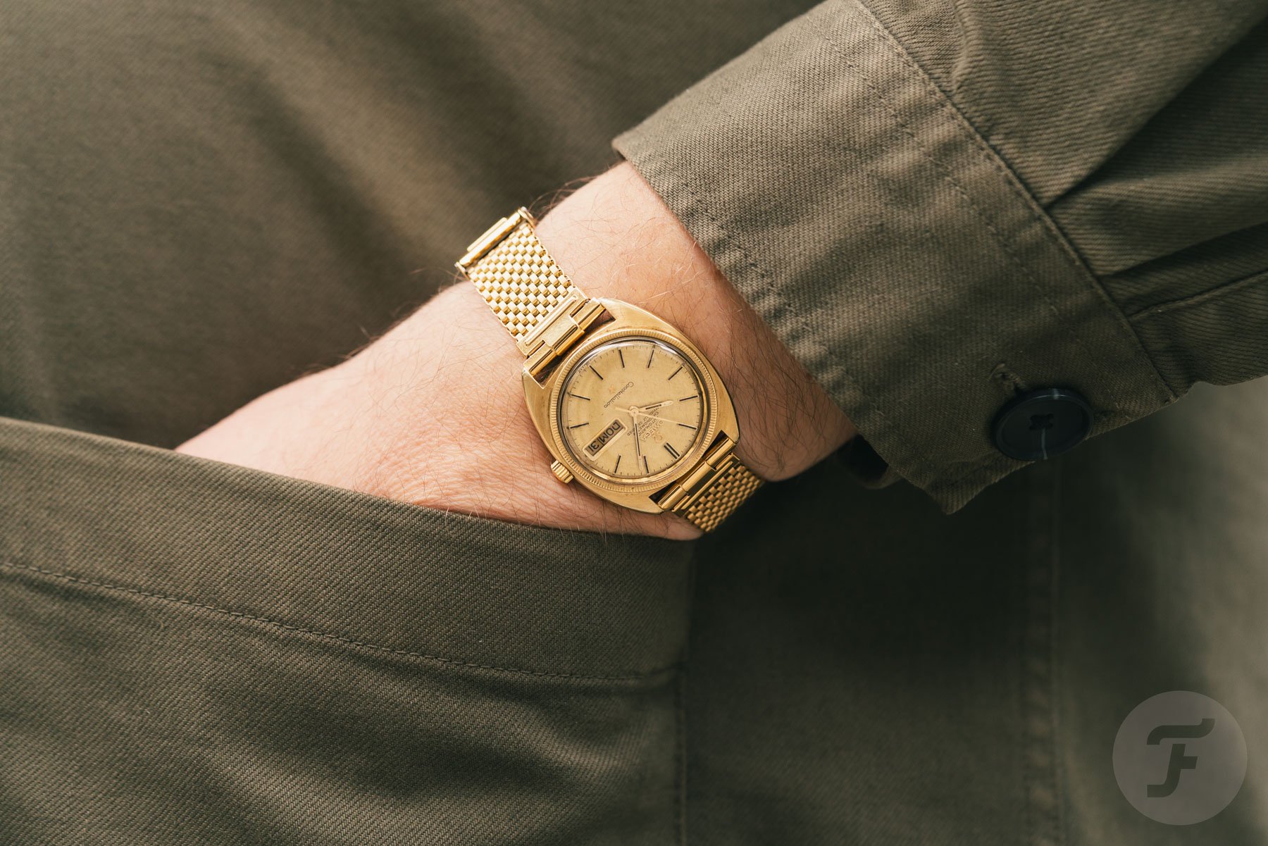Gold-plated Fourstoner Komfit Mesh Bracelet, Omega Constellation in Pocket Shot